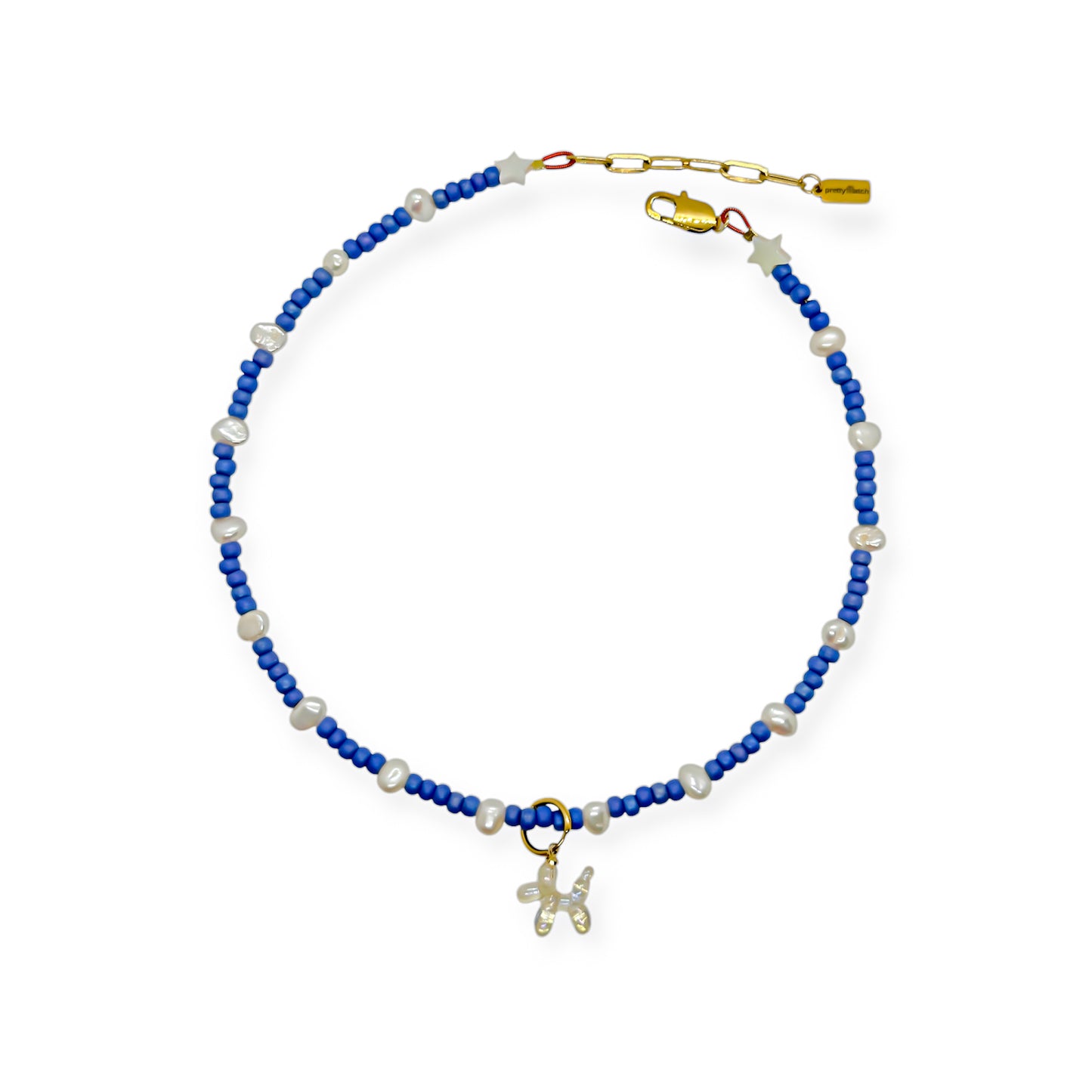Denim pup met parels ketting