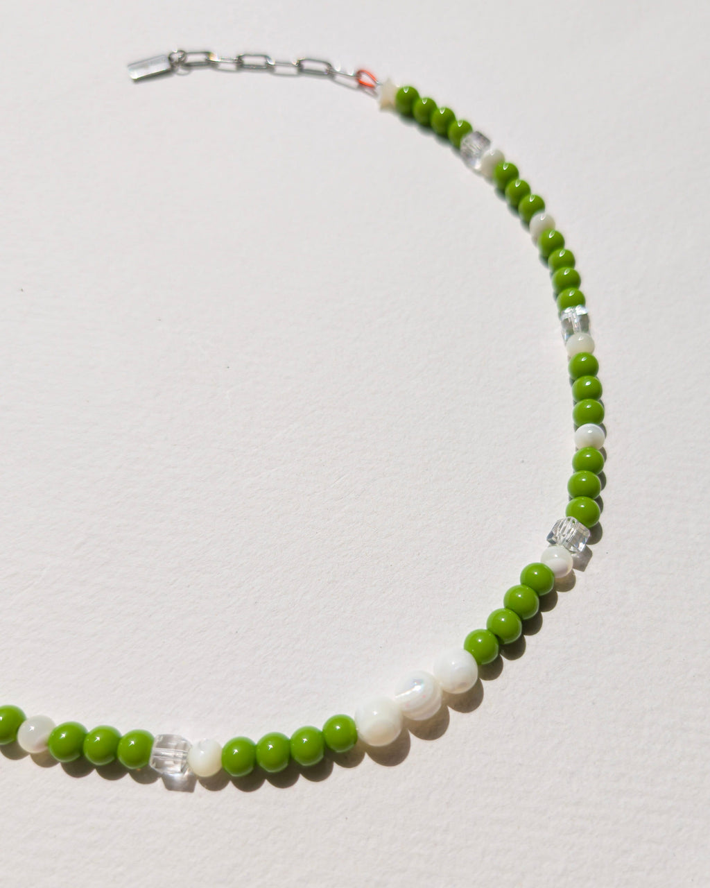 handmade beaded necklace Daily Matcha, green glass beads mother-of-pearl clear faceted cubes stainless steel, Pretty Match Amsterdam