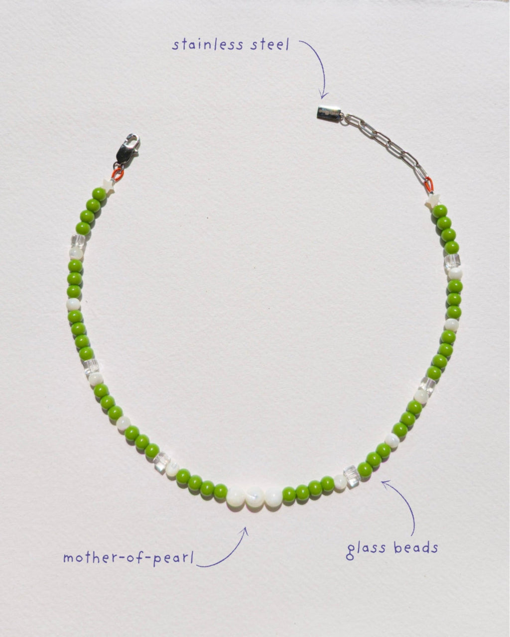 handmade beaded necklace Daily Matcha, green glass beads mother-of-pearl clear faceted cubes stainless steel, Pretty Match Amsterdam