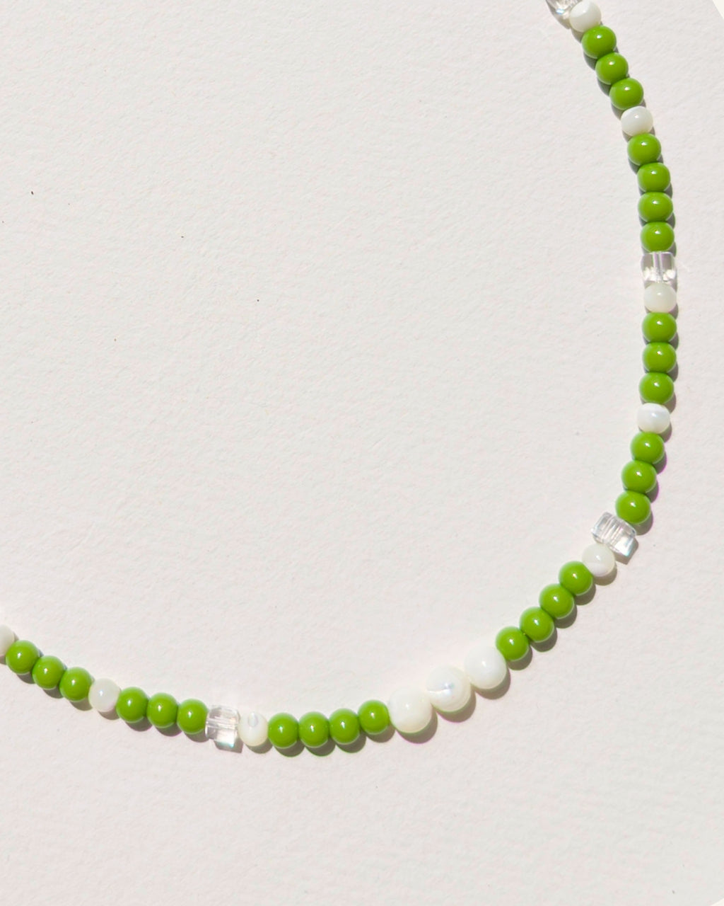 handmade beaded necklace Daily Matcha, green glass beads mother-of-pearl clear faceted cubes stainless steel, Pretty Match Amsterdam