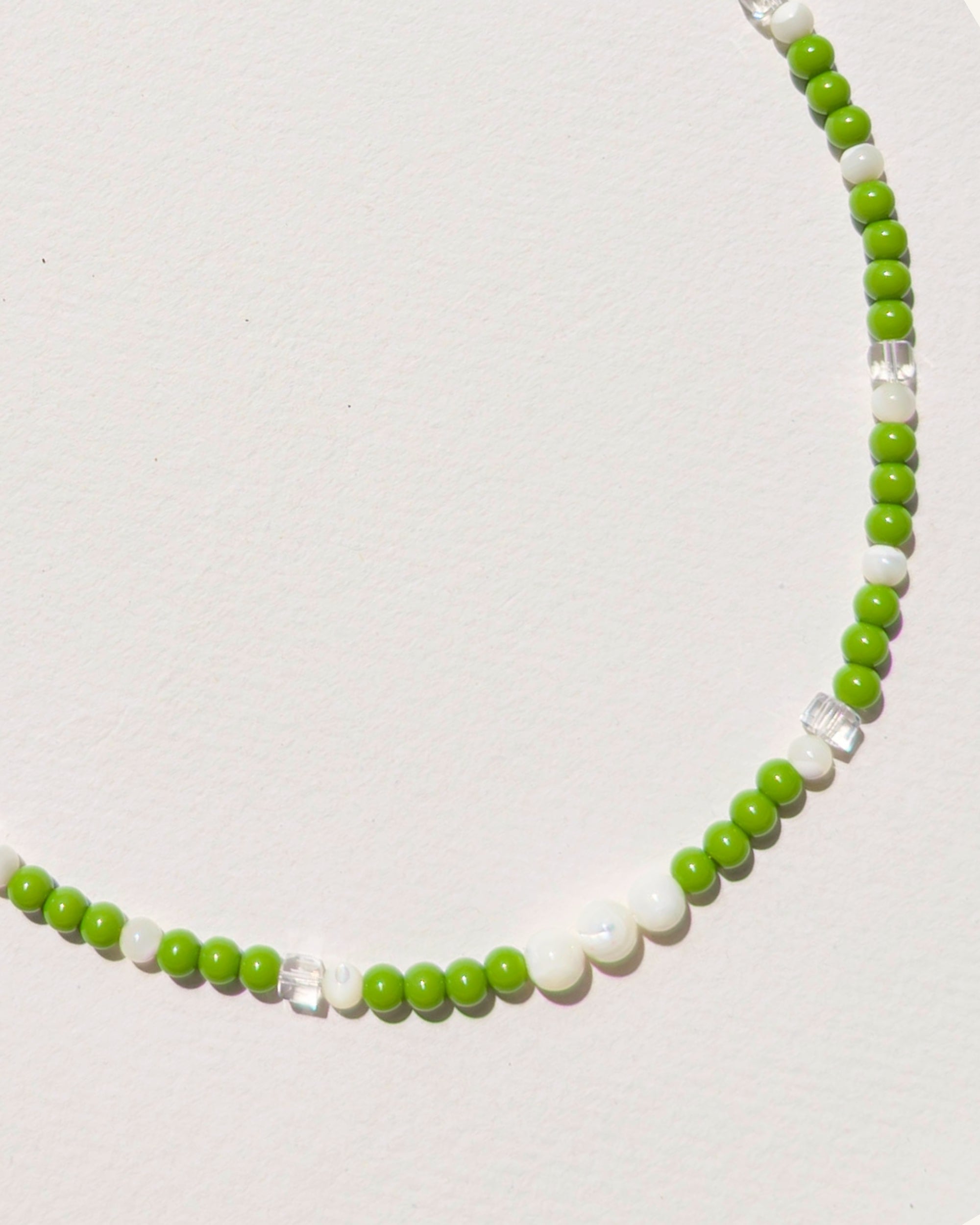 handmade beaded necklace Daily Matcha, green glass beads mother-of-pearl clear faceted cubes stainless steel, Pretty Match Amsterdam